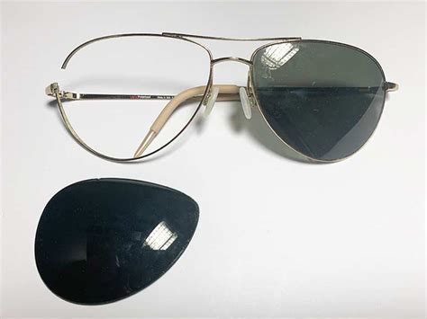 repair of ray ban sunglasses.